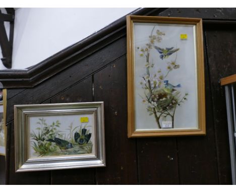 Two framed ceramic paintings of birds