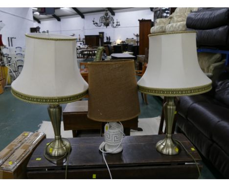 Matching pair of brass effect lamps, 68 cm high, and ceramic lamp with hessian shade