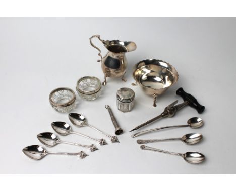 Collection of silver and silver topped bottles, teaspoons, jug, sugar basin etc 