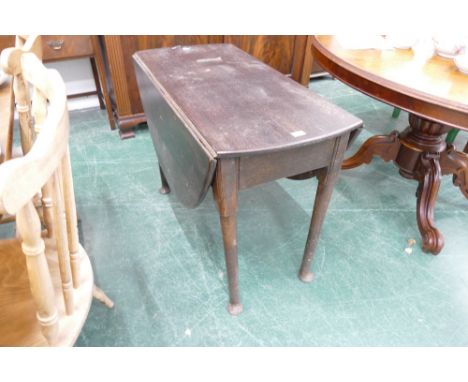 Georgian, oak gate leg table with pad feet. Height 69cm, width 92cm, length 120cm.