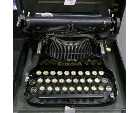 Corona folding typewriter in case