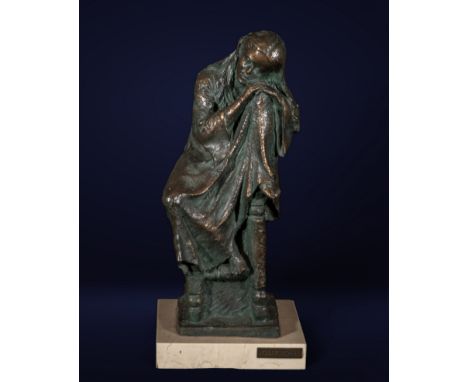 Bronze sculpture representing a figure in deep meditation, possibly reflecting a moment of introspection or contemplation. Th