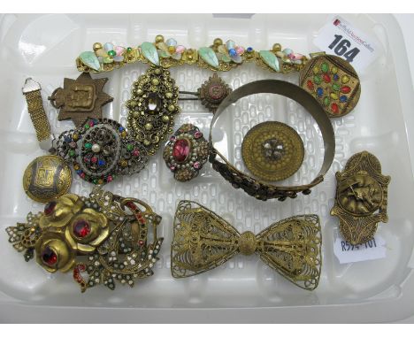 A Collection of Czechoslovakian Style Costume Jewellery, including ornate brooches, openwork claw set bangle, similar panel s