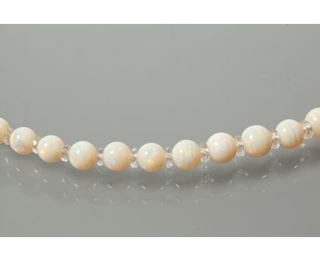 EARLY-MID TWENTIETH CENTURY OPAL BEAD NECKLACE
set with graduated spherical opal beads, interspersed with crystal beads, with
