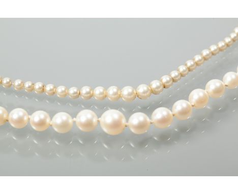 GRADUATED PEARL NECKLACE
the largest pearl 7.05mm diameter, the smallest pearl 3.00mm diameter, with a silver clasp, 52cm lon