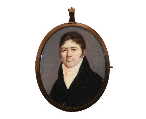 λ French School c.1800Portrait miniature of a gentleman wearing a black coatOval, in a gilt metal brooch frame, the glazed re