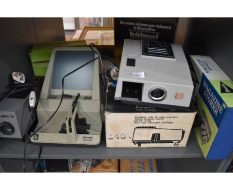 A Hahnel DB Universal slide projector/ viewer in original box,&nbsp; a Boots slide projector and a Boots 1Q slide projector w