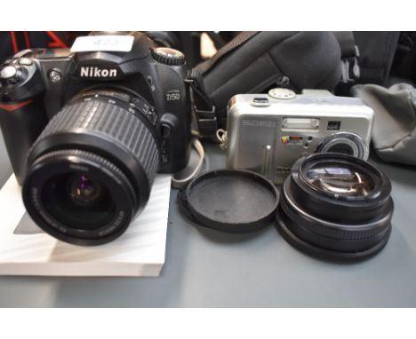 A Nikon D50 digital camera with Nikkor 18-55mm lens and Vitacon0.45x wide lens and Kodak Easyshare CX7530 digital camera