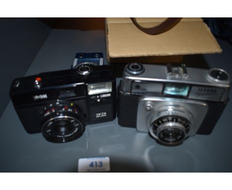 A selection of cameras and equipment including Ilford Sportsman, Prayonx 35mm, light meters, filters etc