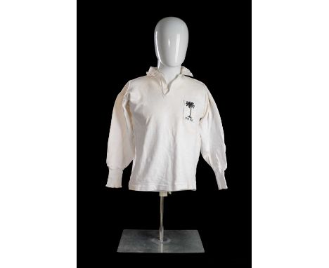 SAMU NAQELEVUKI | FIJI | 1969All white jersey, match worn by Samu Naqelevuki (1944-2002). Embroidered palm tree crest with th