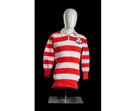 NOBUYUKI UEYAMA | JAPAN | 1975Red and white hooped jersey, match worn by Ueyama (b.1939). Embroidered and silk crest of green