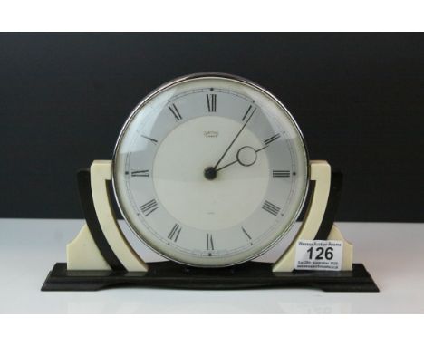 Classic Art Deco Smiths 8 day Mantle Clock, the circular face held on a Brown and Cream Bakelite Frame, 26cms long 
