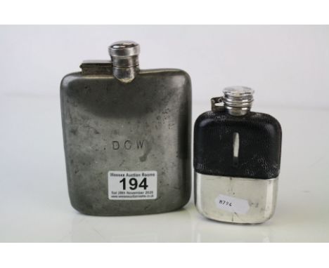 Two vintage hip flasks to include a pewter example together with a leather covered example.