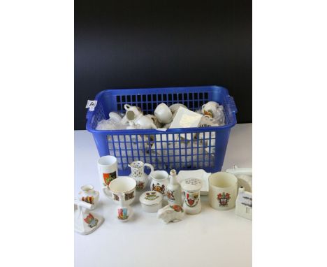 A quantity of vintage crested china to include man with machine gun, Howitzer gun, letter box.cottges. 