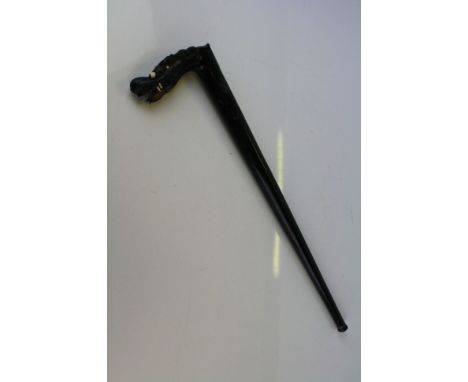 An oriental ebony bladed swagger stick with ornately carved dragon head decoration to the handle. 