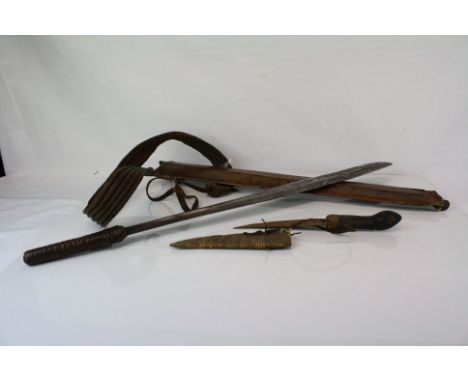 A vintage Indonesian Dayak Sword / Knife with leather sheath together with a small knife with snakeskin sheath. 