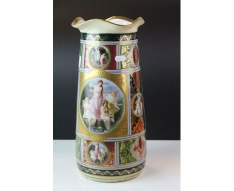 Vienna Style Ceramic Vase decorated with panels of classical figures on a pink, blue and green ground with gilt highlights, b