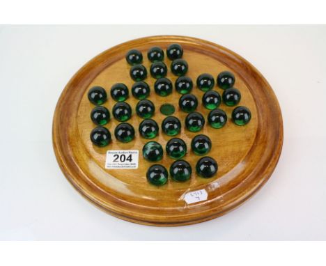 Vintage Solitaire Board with Dark Green Marbles 