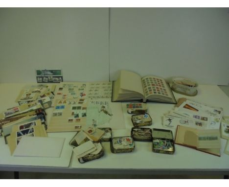 Two Stamp Stock Books, Stamp Album, First Day Covers, Royal Mail Stamp Cards, Six Tobacco Tins of used Stamps on Paper, Royal