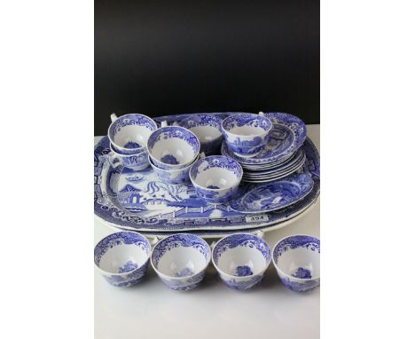 Eleven Italian Spode cups ,seven saucers a side plate together with two willow pattern meat plates. 