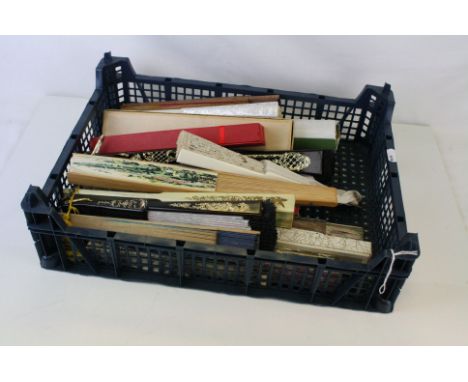 A collection of mainly vintage fans to include souvenir examples 