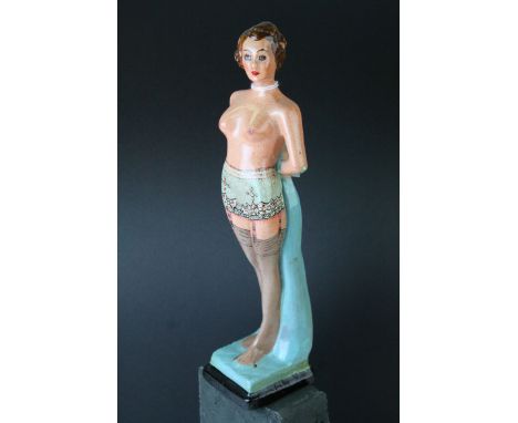 Ceramic Figure of a Mid 20th century Topless Lady wearing suspenders, 27cms high 