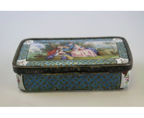 An antique enamel on copper lidded trinket box with ornate decoration to both the exterior and interior. 