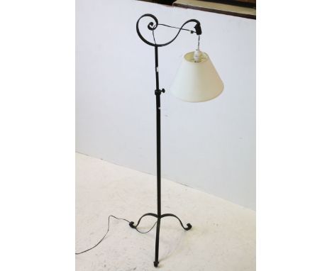 Wrought Iron Standard Lamp together with a Shaped Mahogany Framed Mirror with bevelled edge, 79cms x 53cms 