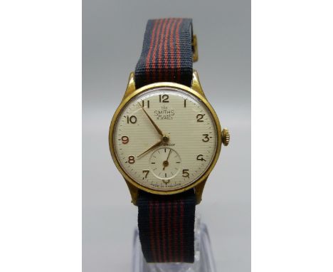A gentleman's vintage Smiths De Luxe 15 jewels wristwatch with subsidiary second hand 