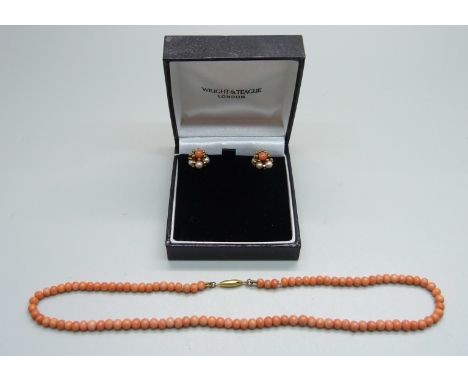 A pair of 9ct gold, coral and pearl earrings and a 9ct gold mounted coral necklace, 37cm 