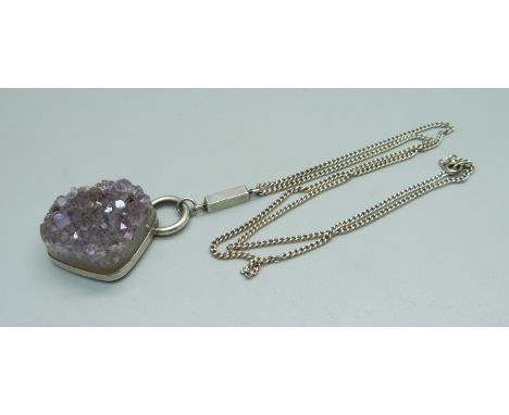 A Swedish Alton silver modernist amethyst pendant by designer Ke Palmberg, on a silver chain 