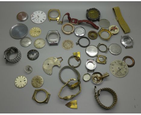 Assorted wristwatch and pocket watch parts including Timex and Ingersoll 