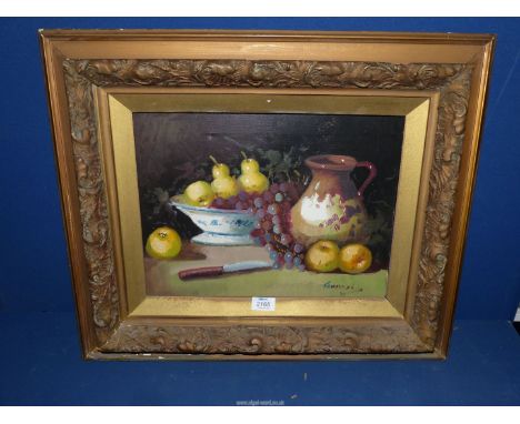 A framed Still Life Oil on canvas depicting a bowl of fruit and brown jug, indistinctly signed lower right, 24 1/2" x 20 1/2"