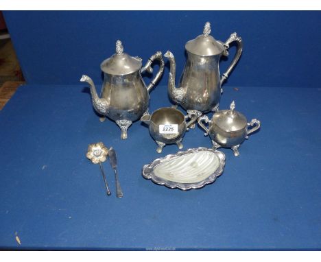 A heavy plated four piece teaset to include; teapot, hot water jug, milk jug, sucrier, butter dish, etc.