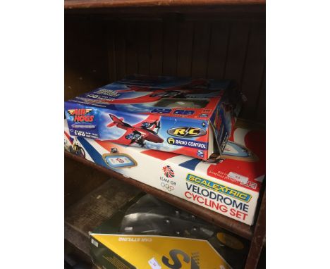 RADIO CONTROLLED PLANE AND SCALEXTRIC CYCLING GAME