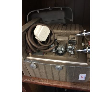 BELL AND HOWELL CINE PROJECTOR