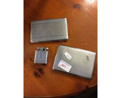 TWO CIGARETTE CASES AND A LIGHTER    C