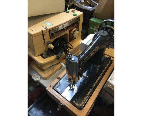 2 SINGER SEWING MACHINES 1 ELECTRIC AND 1 MANUAL