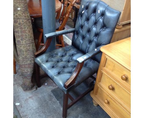 A REPRODUCTION GAINSBOROUGH STYLE BUTTON LEATHER CHAIR