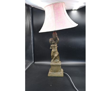 Table lamp, sculptured cherub holding a vase&nbsp; 37cm tall
