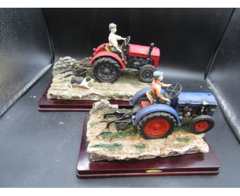 2 Juliano collection tractor ornaments. dogs tail broken on one and a chip on other