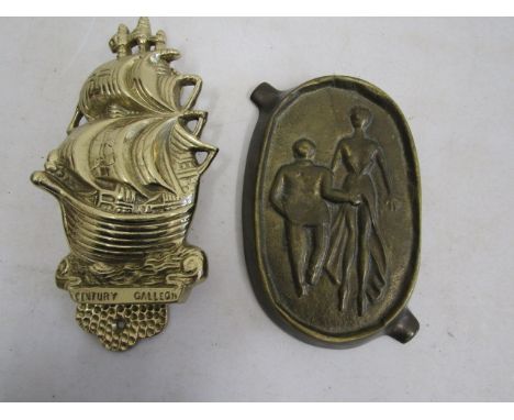 Brass 'cheeky' tongue in cheek ashtray and a brass ship door knocker