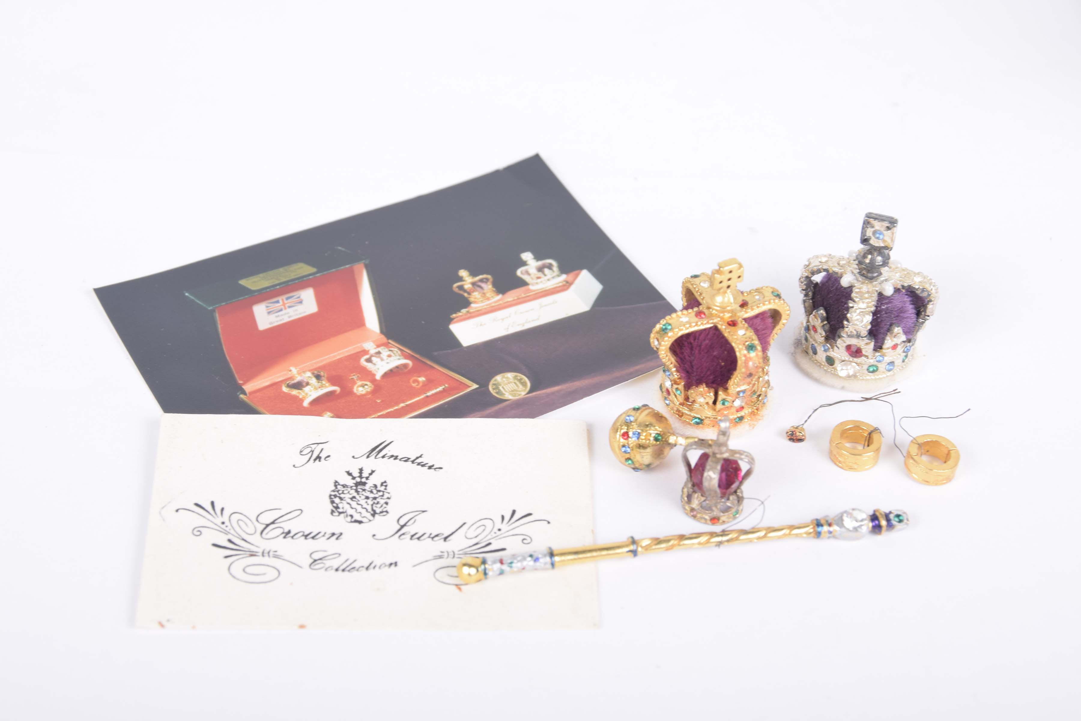 The miniature Royal Crown Jewel Collection set To include; two miniature crowns, an orb and scept