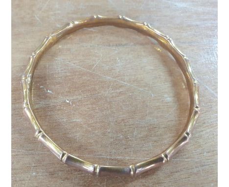 Large 9ct rose gold bangle with bamboo decoration,14.8 grams 