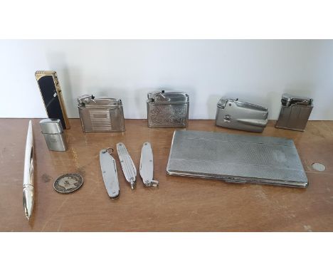Heavy silver coloured pen with unidentified stamps together with a white metal cigarette case, silver coin, 6 lighters and 3 