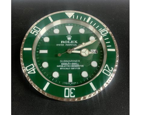Brushed steel, racer green, battery operated dealer wall clock 