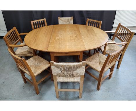 Peter Hall &amp; Son, Cumbria, 1978,&nbsp;Bespoke one-off, Oak gate-leg and drop-leaf dining table with cutlery drawer, two c