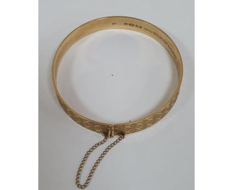 Solid 9ct gold etched bangle,14.4 grams 