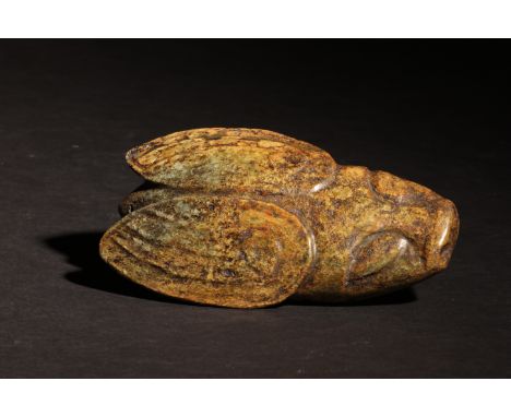 Han Dynasty (202 BC-9 AD, 25â€“220 AD). Cicada. Carved Jade (?). Archaic jade cicadas were treasures of the Han Dynasty and w