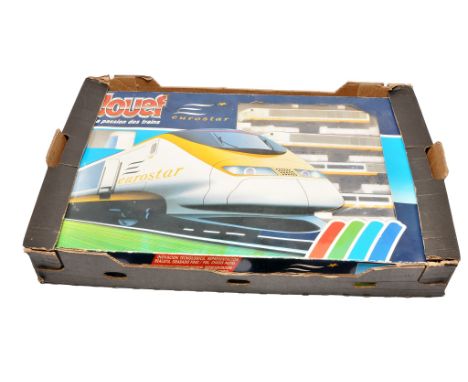 A Jouef Eurostar Locomotive and Coach Set in original box. Untested. 